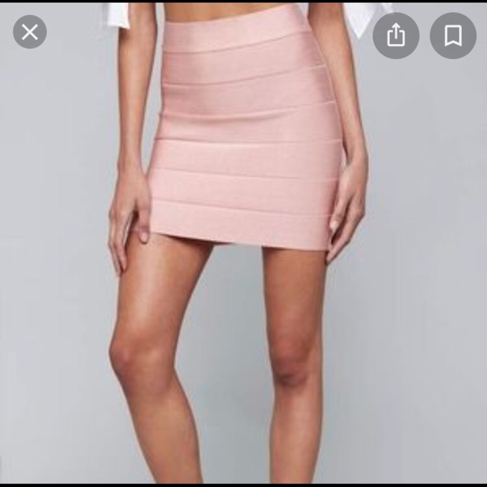 bebe pink mini skirt size large.